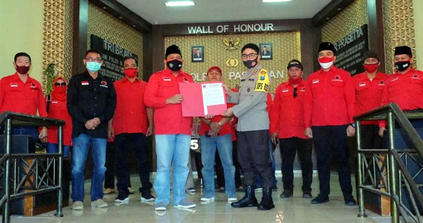 Pengurus PDIP Kabupaten Pasuruan menyampaikan surat resmi ke Kapolres Pasuruan. (ist)